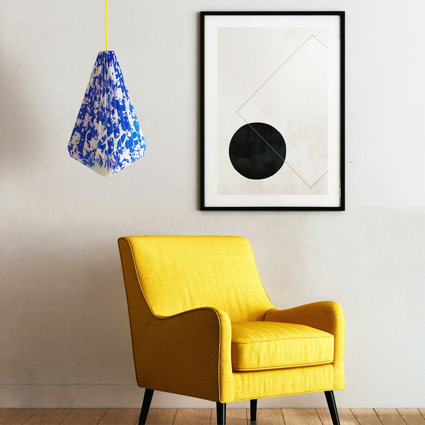 Laboratoire Textile N135 geometric pendant light in blue and white patterned finish, suspended in a contemporary living space.